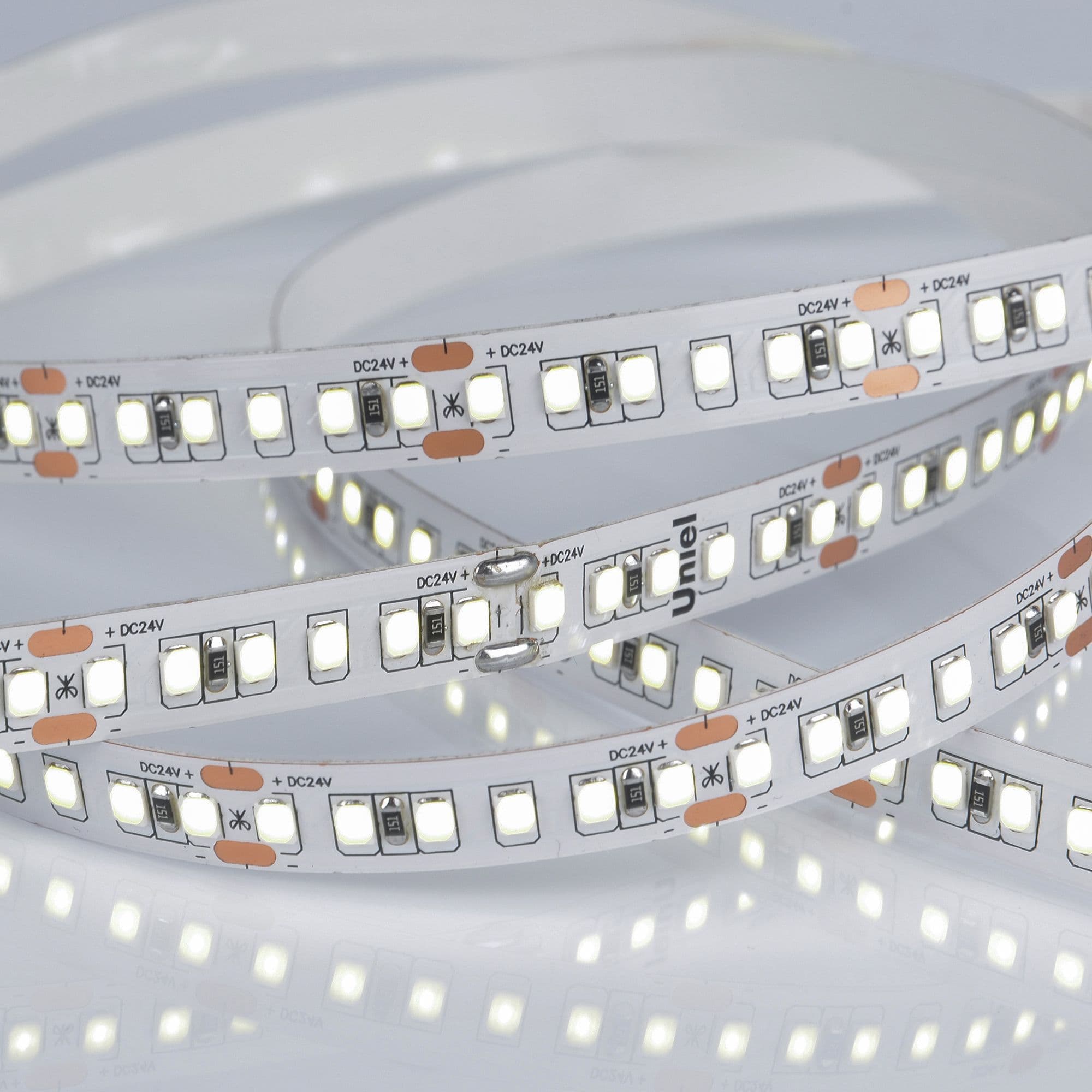 Лента гибкая светодиодная на самоклеящейся основе. ULS-2835-168LED/m-10мм-IP20-DC24V-14W/m-5м-6500K Катушка 5 м. в герметичной упаковке. (6500K)