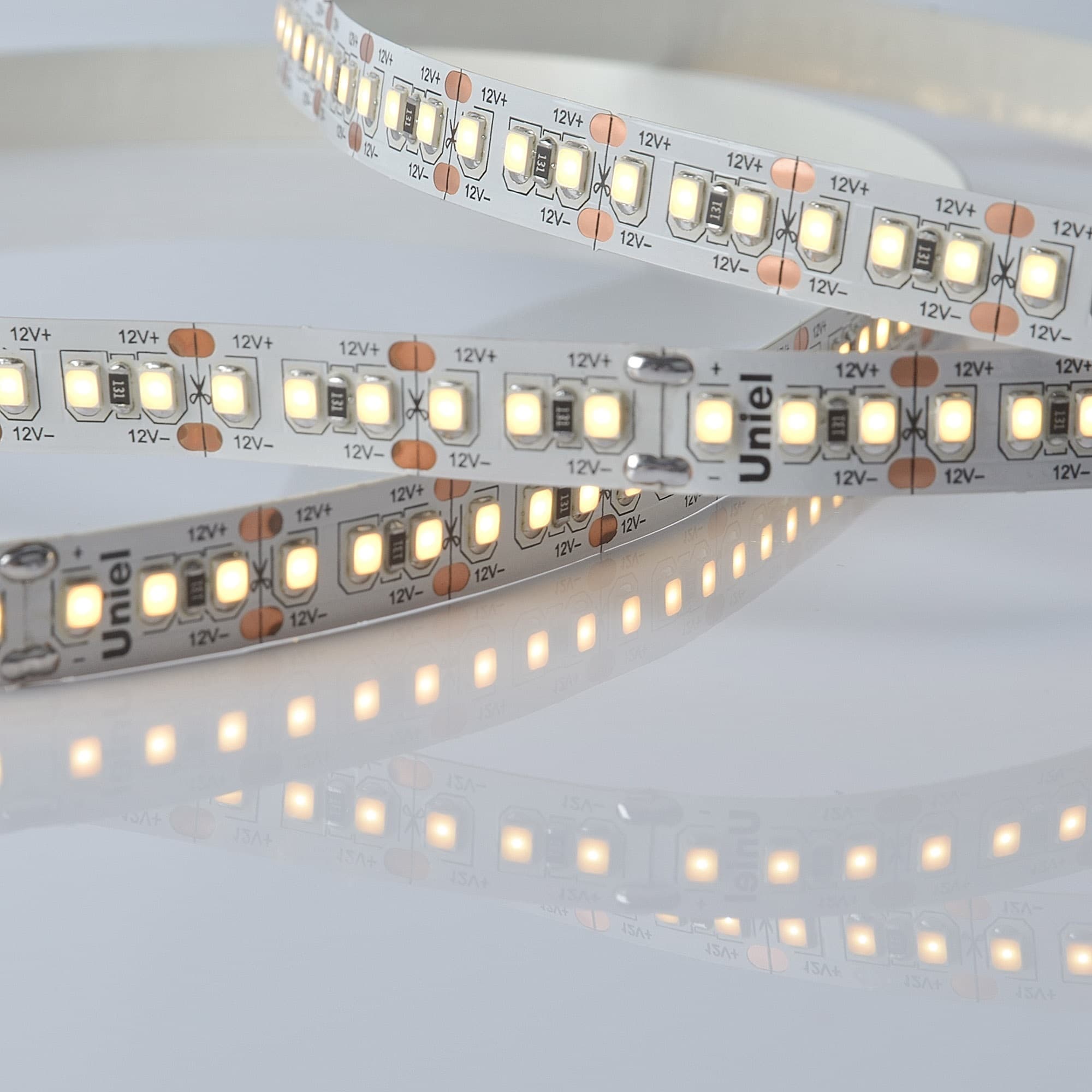 Лента светодиодная гибкая на самоклеящейся основе 17Вт/м 12В 3000K IP20 180LED/м катушка 5м. в герметичной упаковке