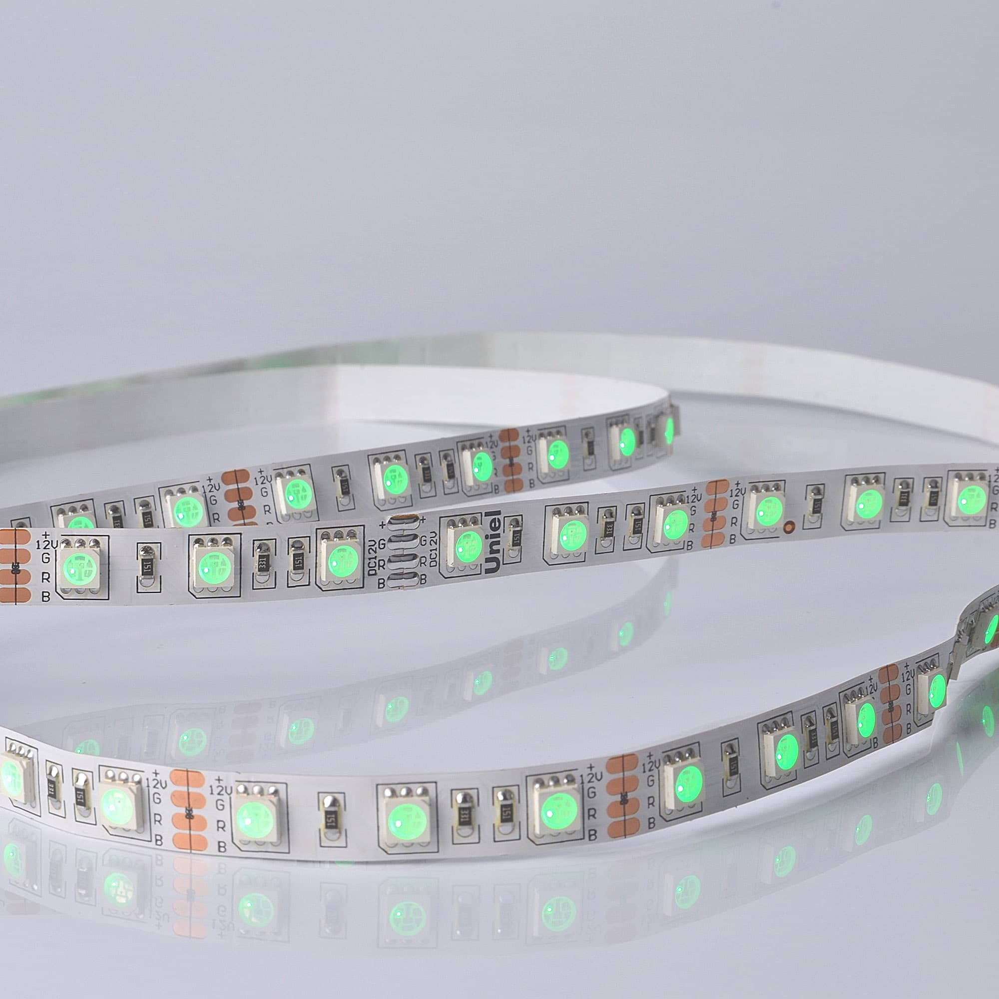 Лента светодиодная гибкая на самоклеящейся основе. ULS-M25-5050-60LED/m-10mm-IP20-DC12V-14,4W/m-5M-RGB PROFI Катушка 5 м. в герметичной упаковке. RGB