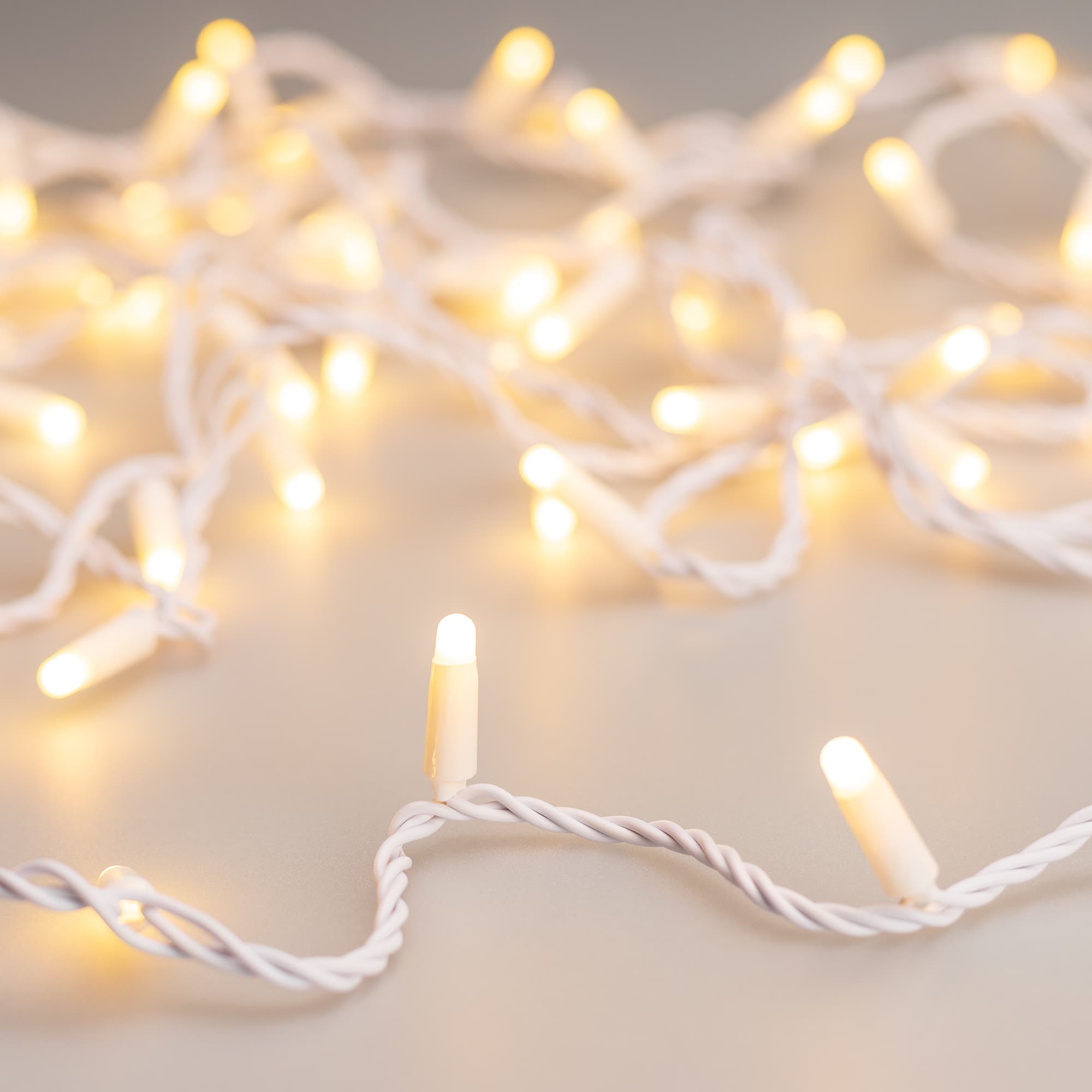 Гирлянда светодиодная декоративная ARD-STRING-CLASSIC-10000-WHITE-100LED-MILK-STD Warm 230V, 7W ARDCL, IP65